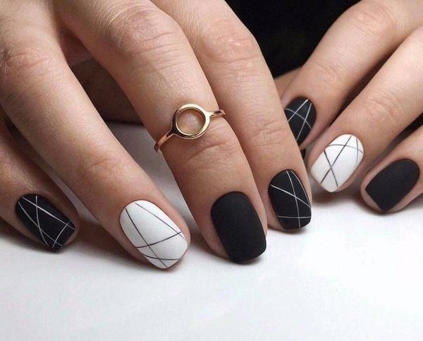 Bela manicure em preto e branco 2020-2021: as melhores idéias em design de unhas em preto e branco em diferentes estilos