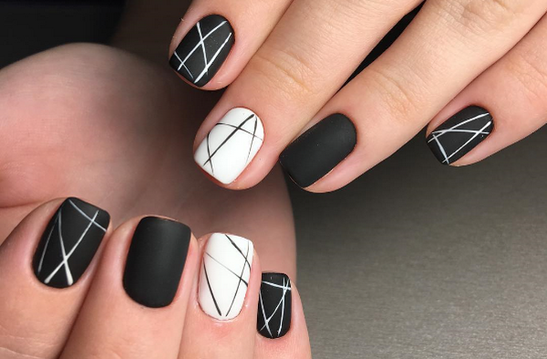 Bela manicure em preto e branco 2020-2021: as melhores idéias em design de unhas em preto e branco em diferentes estilos